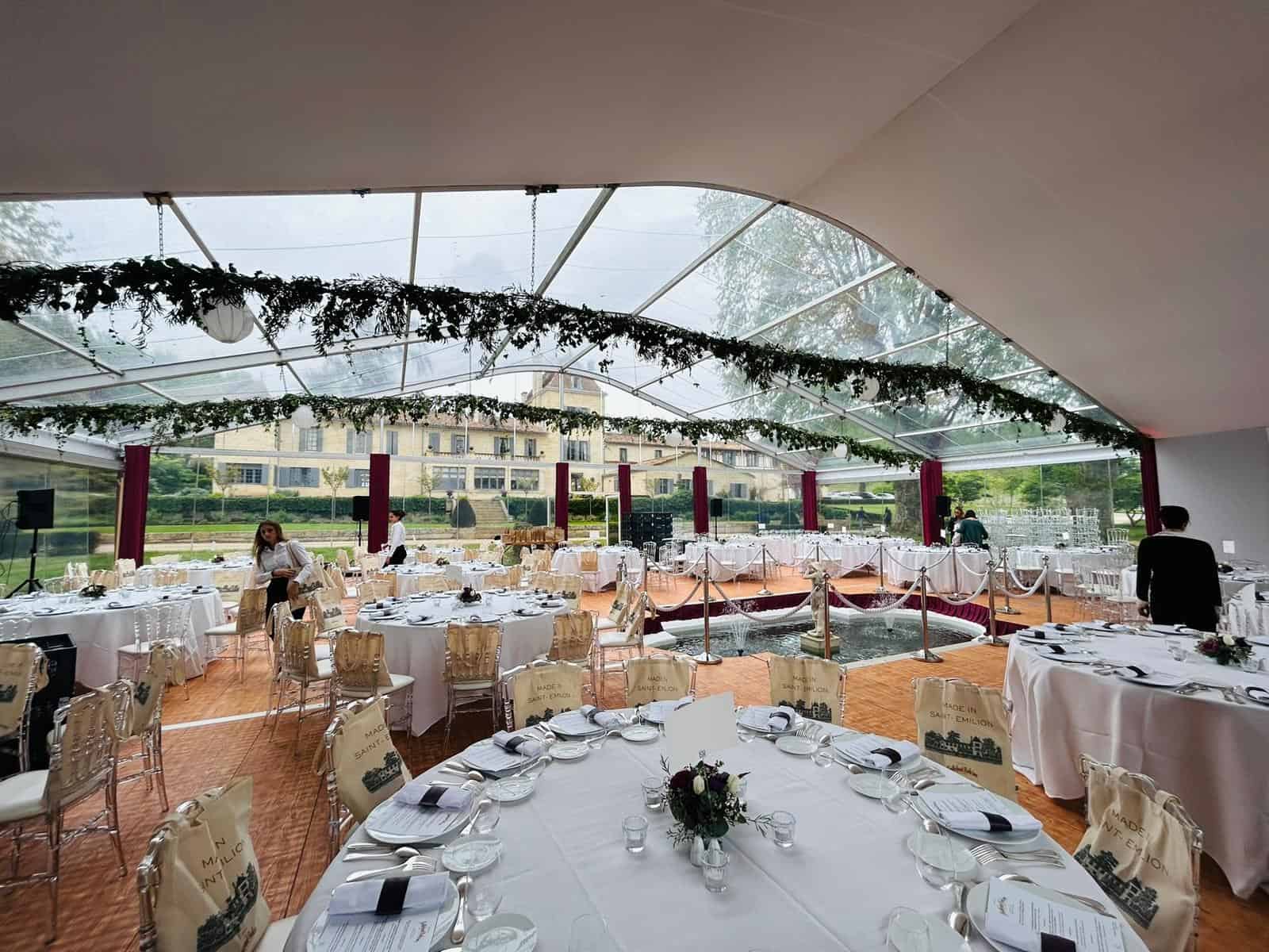 Luxurious event setup at Bellefont Belcier Castle with elegant table arrangements.