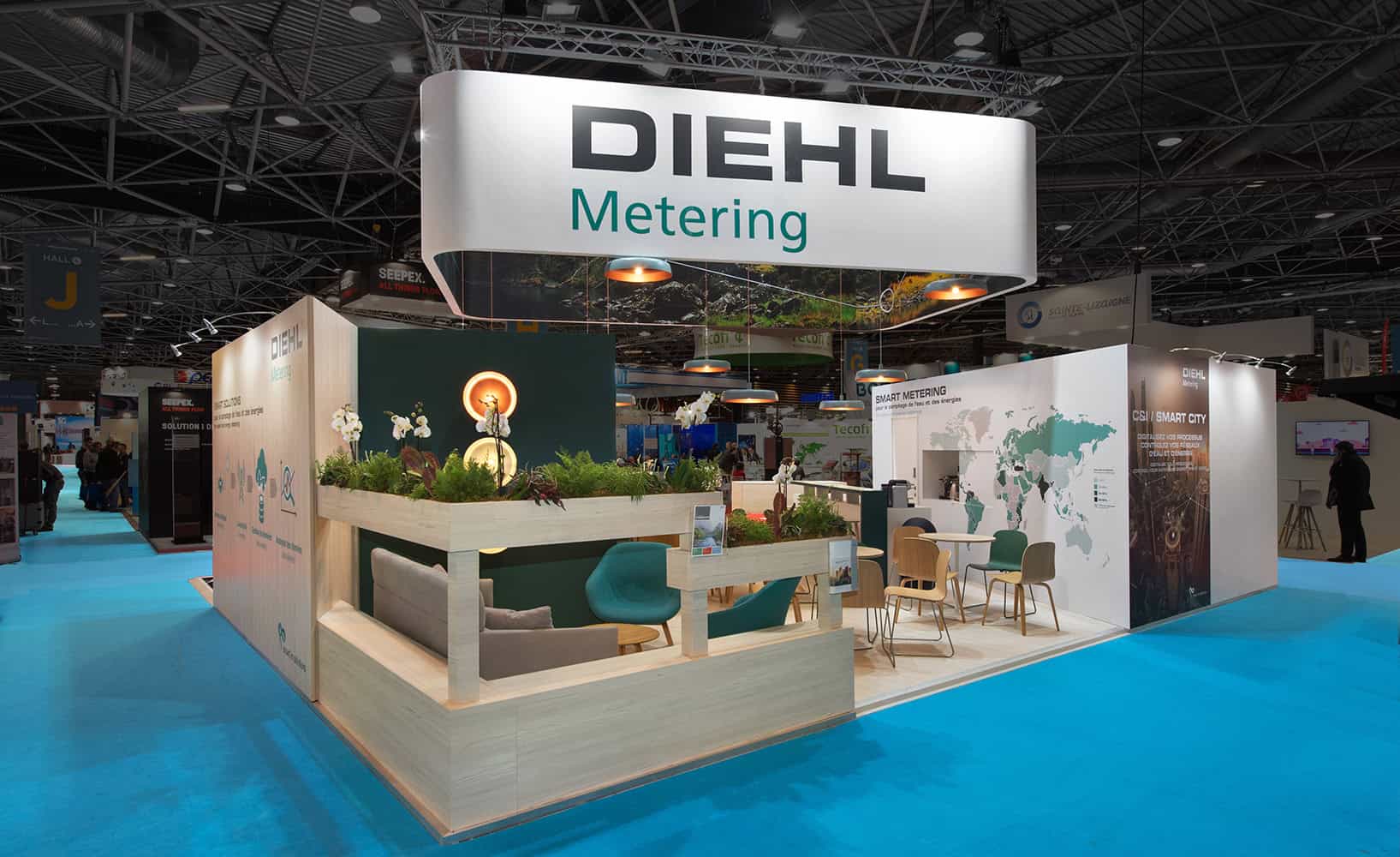 Diehl metering booth at an exhibition showcasing innovative metering solutions.