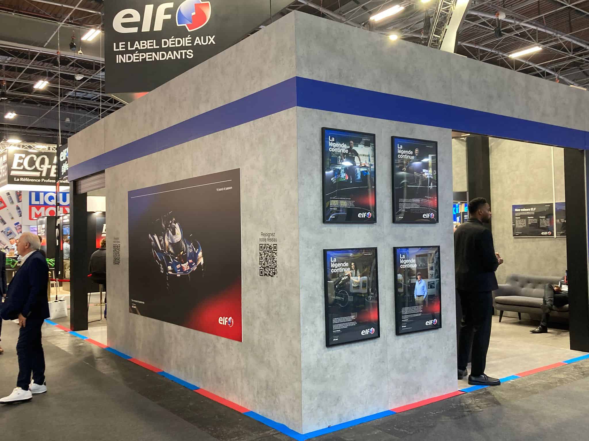 Co-Nect ELF booth showcasing automotive products at trade exhibition.