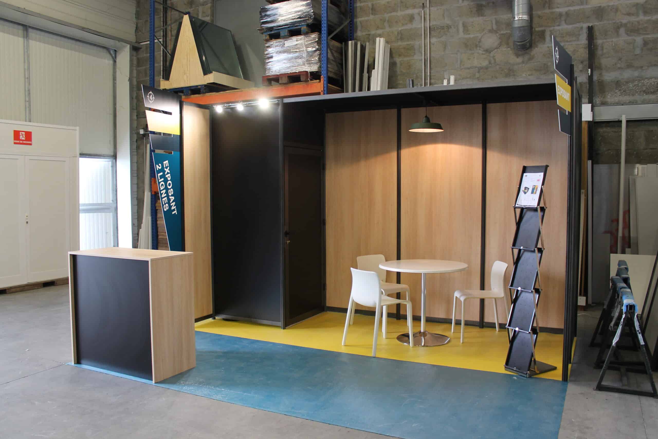 Co-Nect booth at Sofins with seating area and display stand.