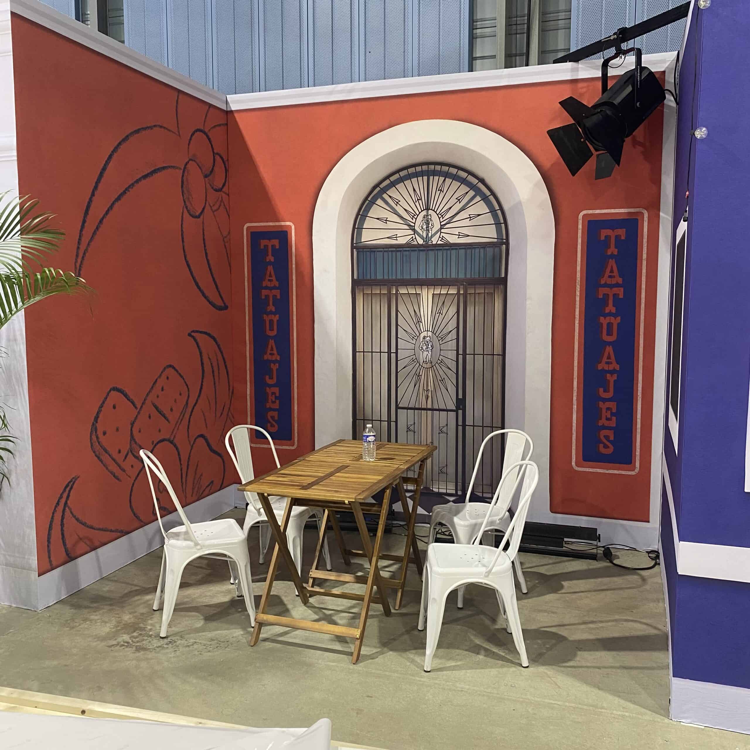 Co-Nect booth at Hennessy Convention with colorful walls and seating area.
