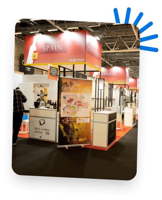 Trade show booth showcasing Spanish wines and regional products.
