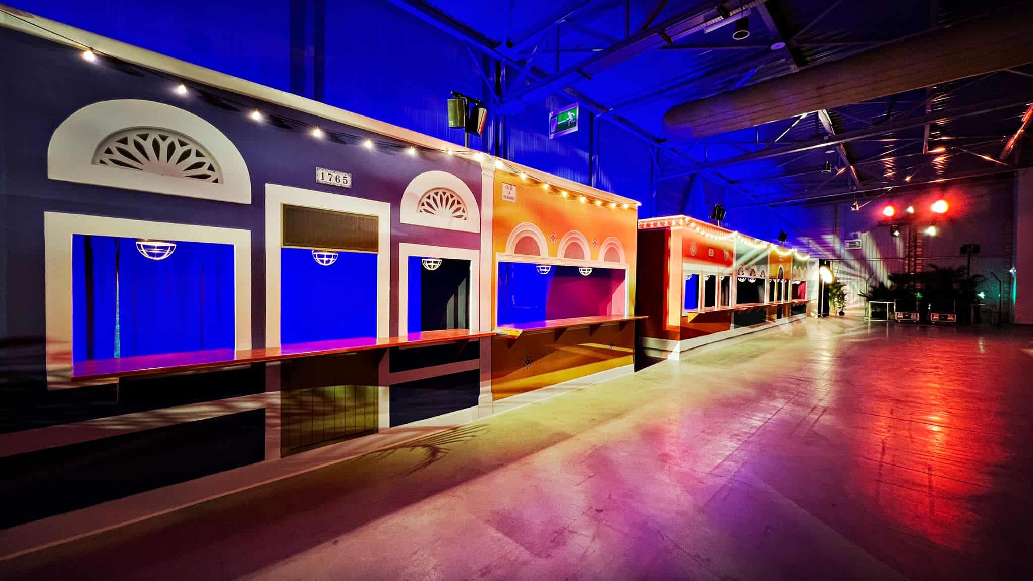 Colorful event stage with vibrant lighting at Hennessy Convention.