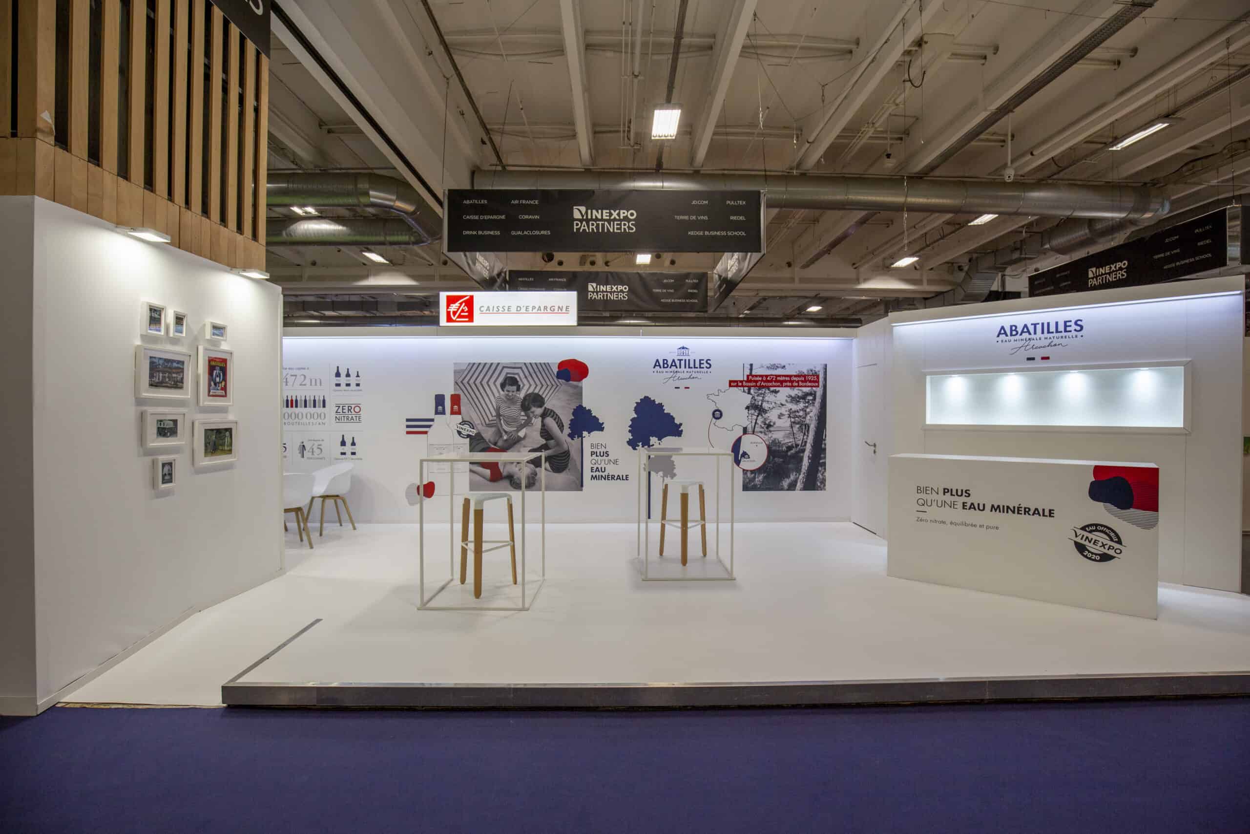 Exhibition booth for Abatilles at a trade show with water-related displays.
