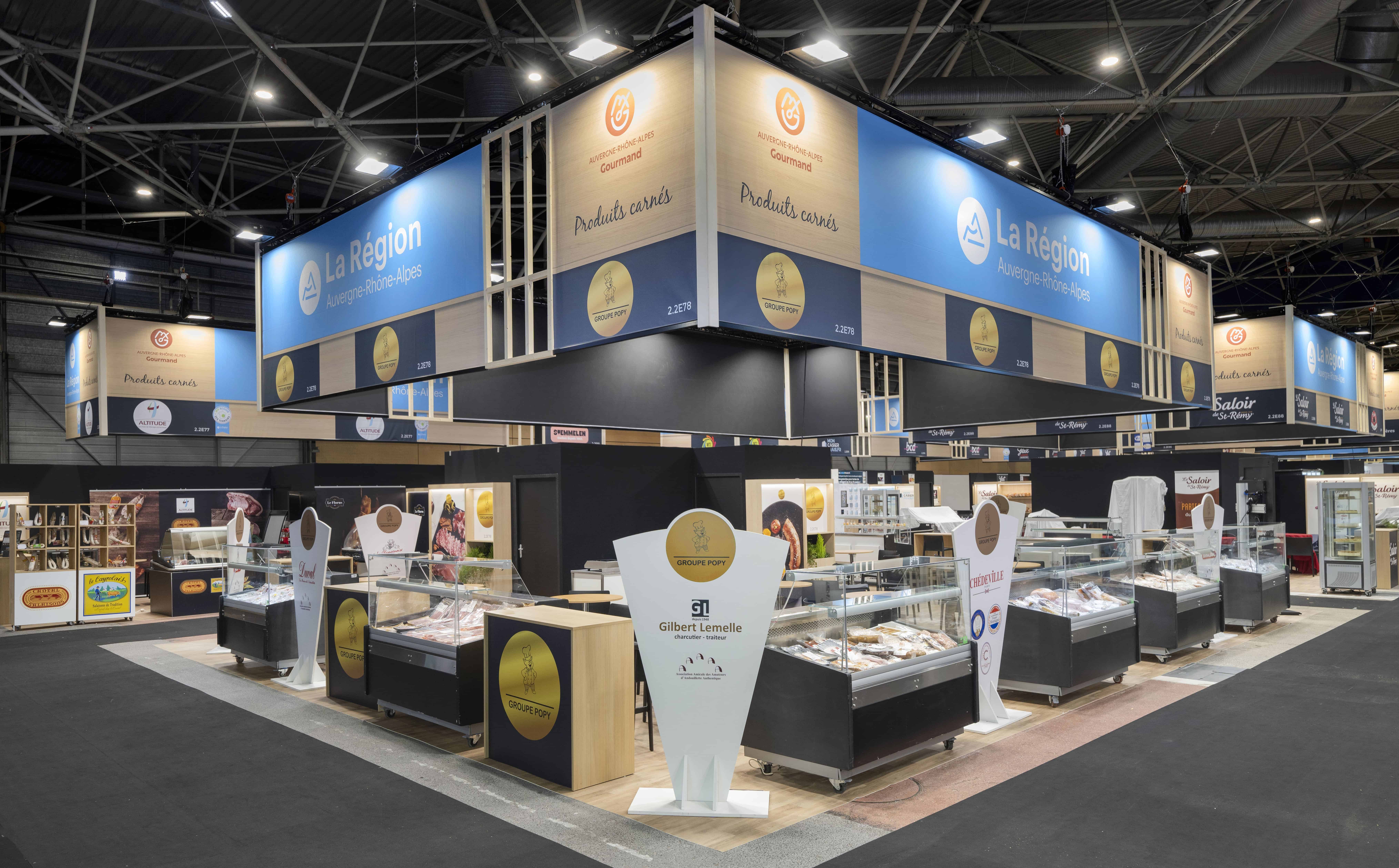 Co-Nect booth at SIRHA showcasing food display cases and equipment.