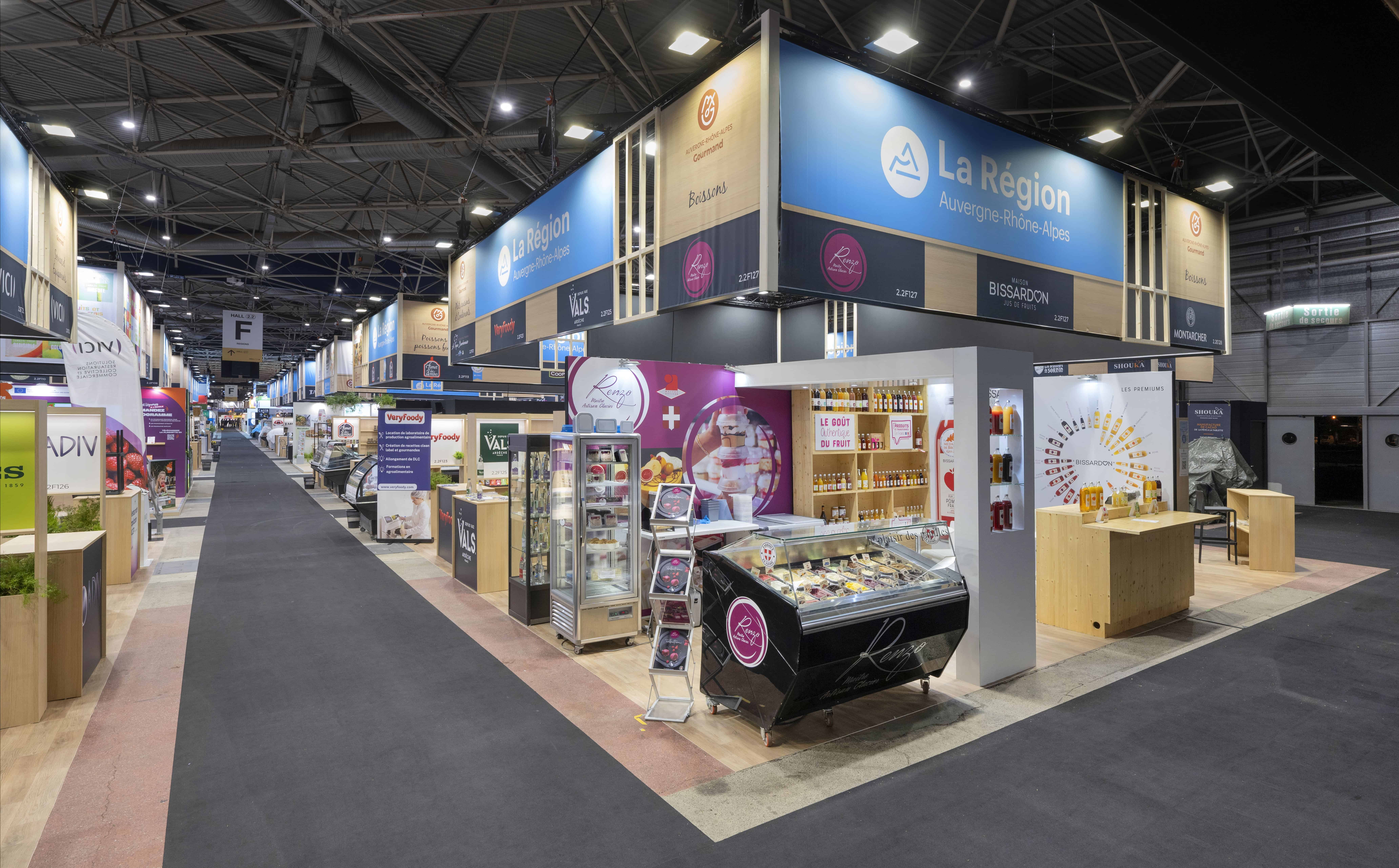 Exhibition booth at SIRHA showcasing regional food products and innovations.