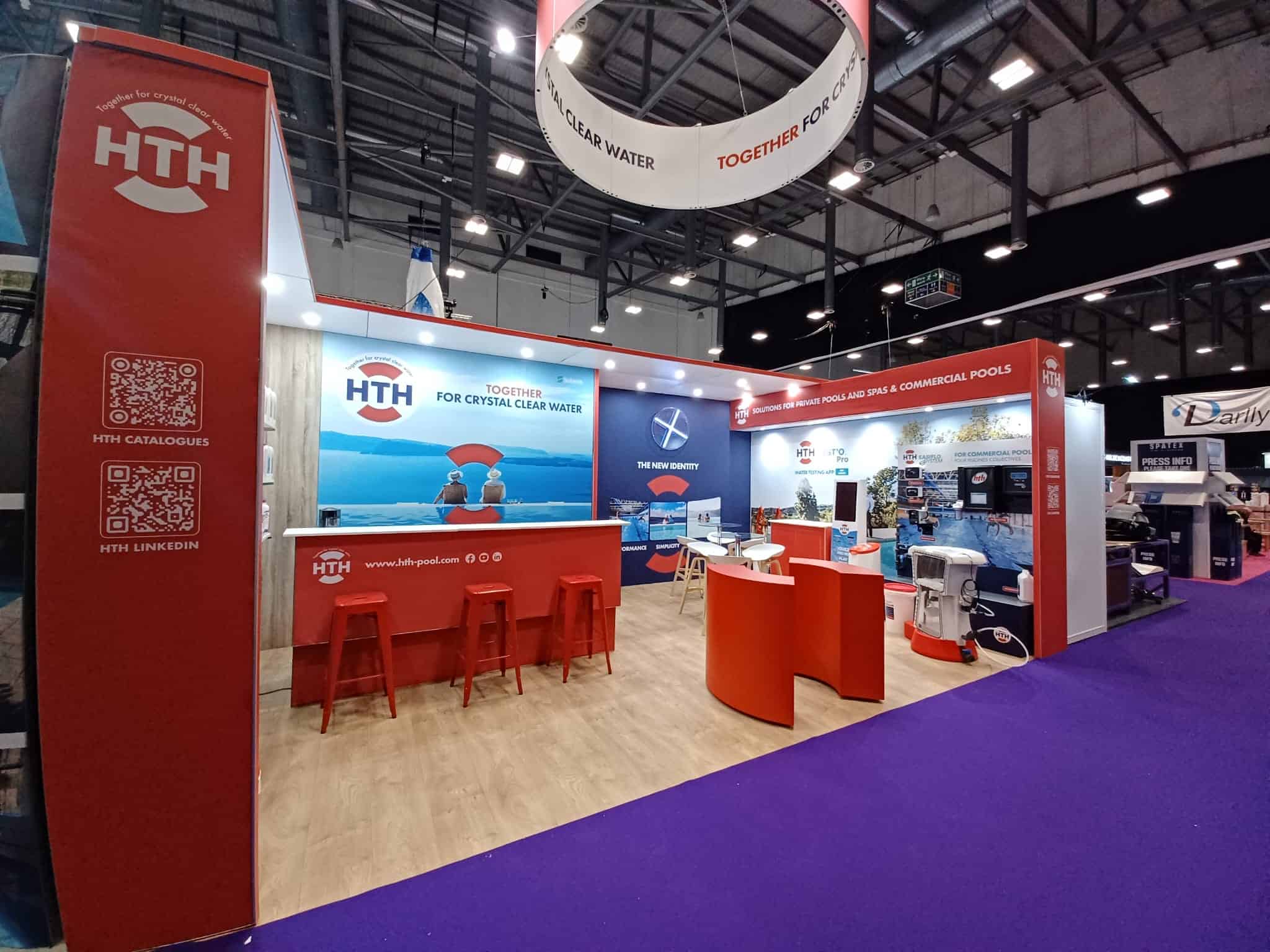 Co-Nect booth at HTH trade show showcasing pool water solutions.