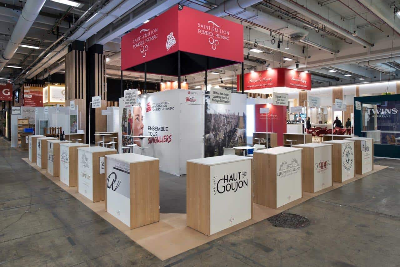 Co-Nect exhibition booth at WINE PARIS showcasing wine regions and producers.
