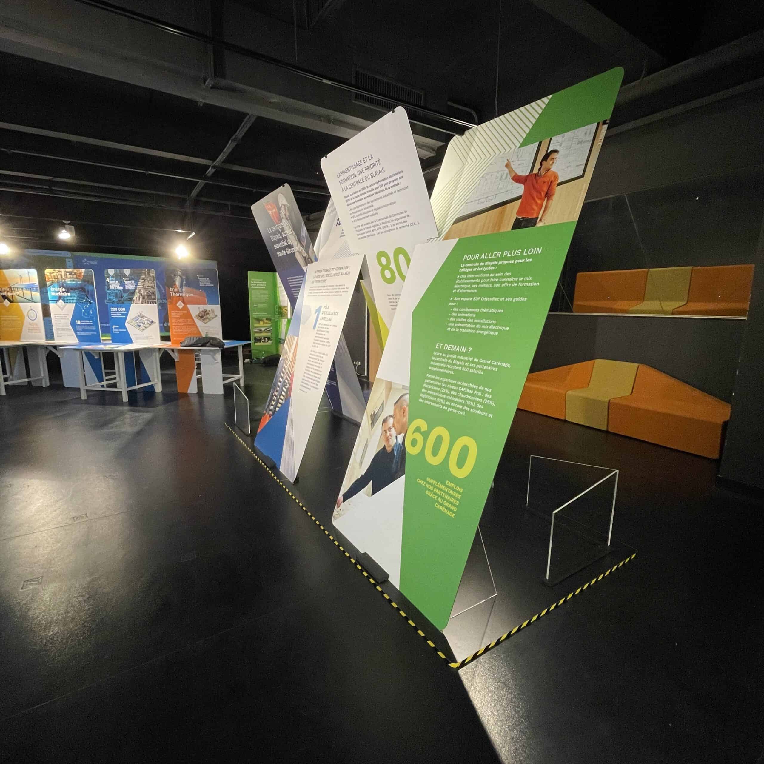 Exhibition display with informational panels at Co-Nect event.